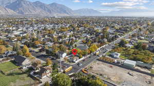 View of property location with a mountainous background and nearby suburban area