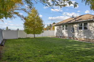 View of fenced backyard