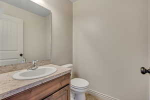 Bathroom with vanity and light tile patterned flooring