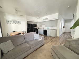 Living area featuring light wood LVP finished floors