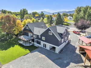 Aerial view of residential area featuring a mountainous background