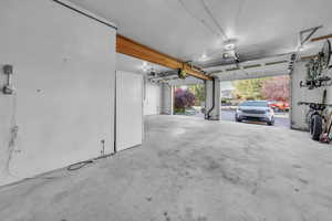 Garage featuring a garage door opener