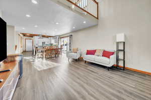 Living room featuring recessed lighting and light wood finished floors