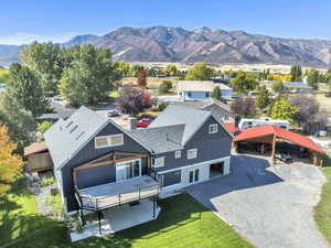 Aerial view of residential area featuring a mountain backdrop