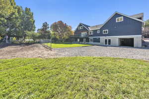 Back of property featuring board and batten siding