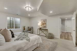Carpeted bedroom featuring recessed lighting and baseboards
