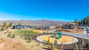 View of mountain background featuring nearby suburban area