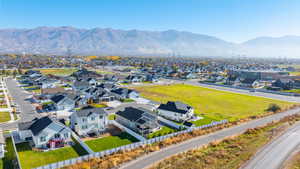 Aerial view of residential area featuring mountains