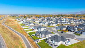 Aerial view of residential area featuring a mountain backdrop
