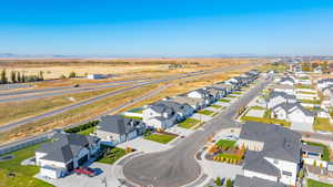 Aerial perspective of suburban area featuring mountains