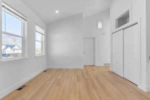 Dining area with vaulted ceilings and mountain views