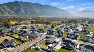 Aerial view of residential area with a mountain backdrop