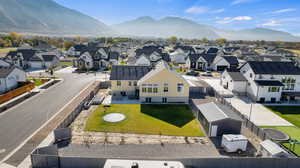 Aerial perspective of suburban area featuring mountains