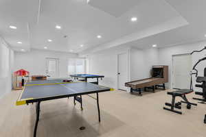 Game room with recessed lighting, light wood finished floors, and billiards table