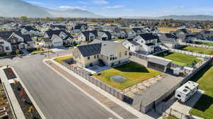 Aerial view of residential area with a mountainous background