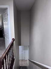 Stairs with tile patterned flooring