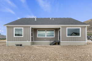 Back of house featuring a covered patio