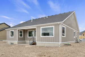 Back of house featuring a covered patio