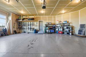 Garage featuring a garage door opener