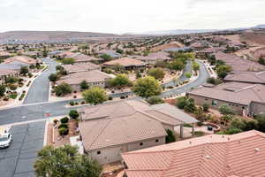 Aerial view of residential area featuring a mountainous background
