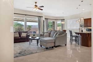 Living area with a ceiling fan