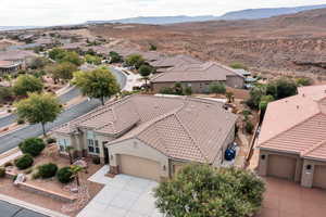 Aerial perspective of suburban area featuring mountains