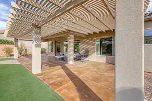 View of patio with a pergola