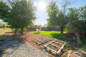 View of yard with a vegetable garden