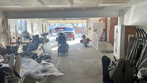 Garage with fridge with ice dispenser