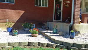 Entrance to property with brick siding