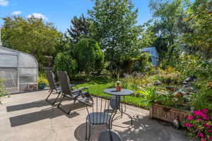 View of patio with an exterior structure and an outdoor structure