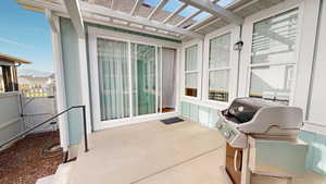 View of back patio and pergola style covering