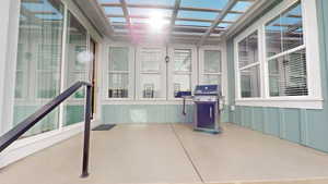 View of back patio and pergola style covering