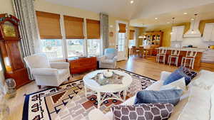 Living room, dining area and kitchen