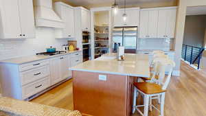 Island with pendants and walk in pantry