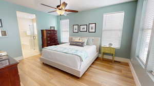 Primary suite with ceiling fan