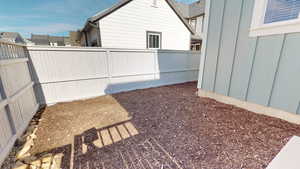 View of fenced backyard
