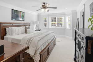Bedroom featuring ornamental molding, ceiling fan, light carpet, and recessed lighting