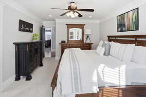 Bedroom with crown molding, ceiling fan, and recessed lighting