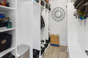 Mudroom with light wood-type flooring