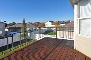 Wooden deck featuring a residential view
