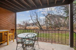 Balcony featuring outdoor dining area