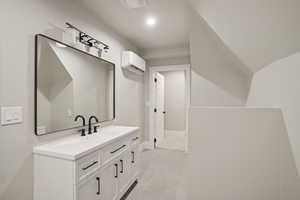 Bathroom featuring vanity and light tile patterned floors