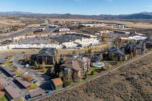 Aerial overview of property's location with a mountain backdrop