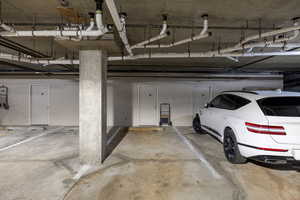 Heated garage with designated parking space and storage closet