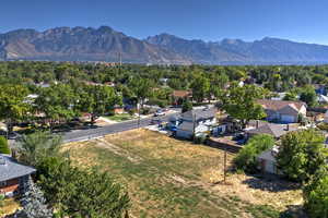 Aerial view of residential area with a mountainous background