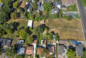 Aerial overview of property's location featuring nearby suburban area