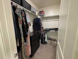 Master view of walk in closet