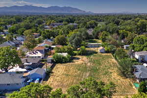 Aerial view of residential area with a mountainous background