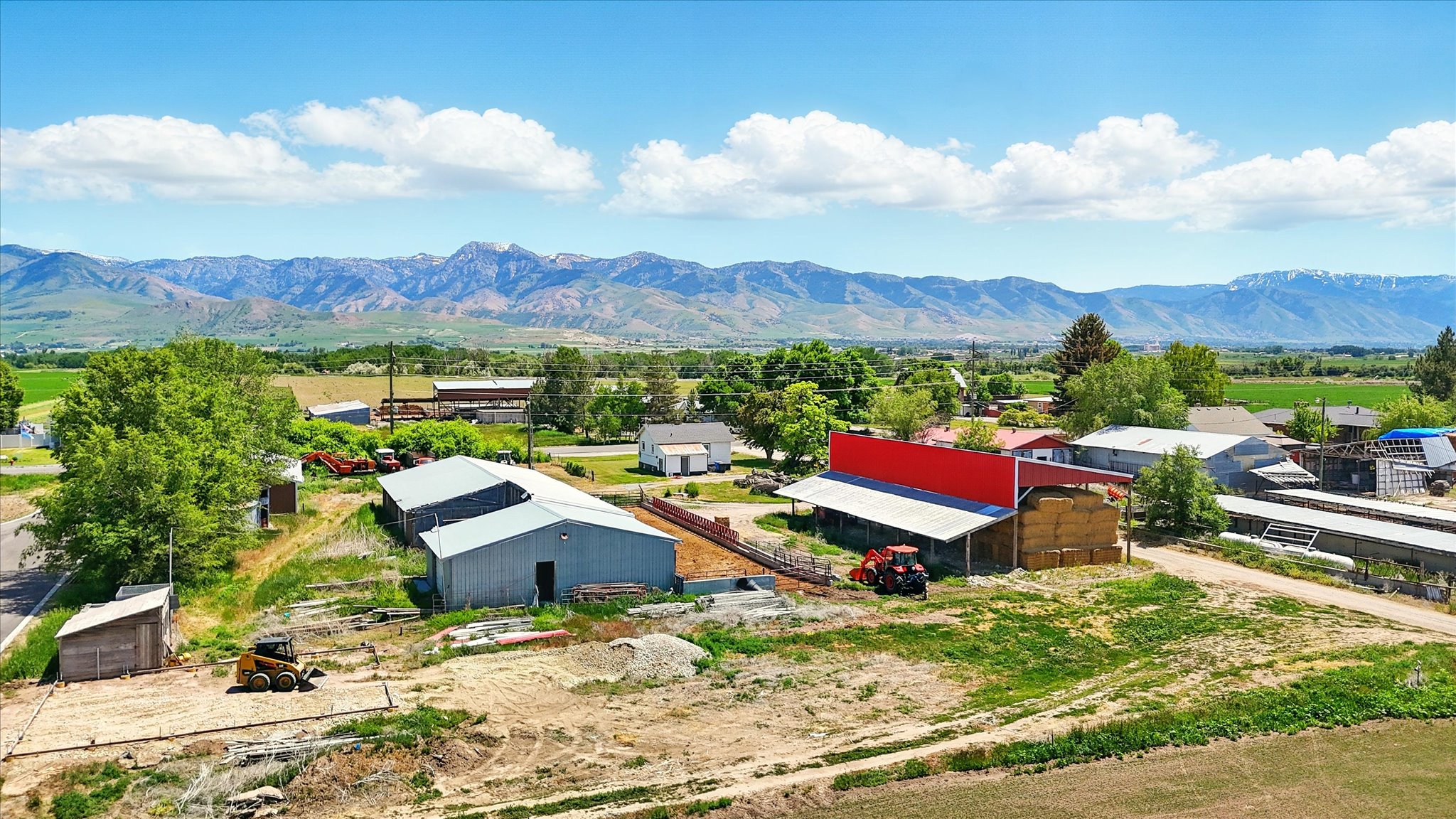 Drone / aerial view of barnyard/outbuildings